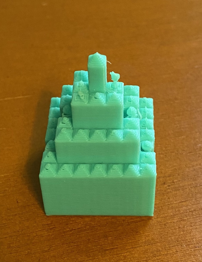 Image of green 3D printed pyramid with pointy tops.